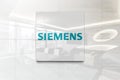 Siemens on glossy office wall realistic texture